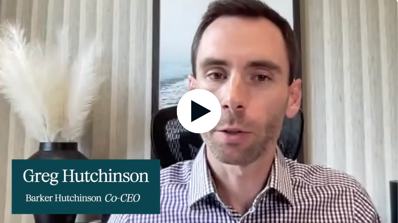 Video still of a man speaking, with on-screen text: 'Greg Hutchinson' and 'Barker Hutchinson Co-CEO'.