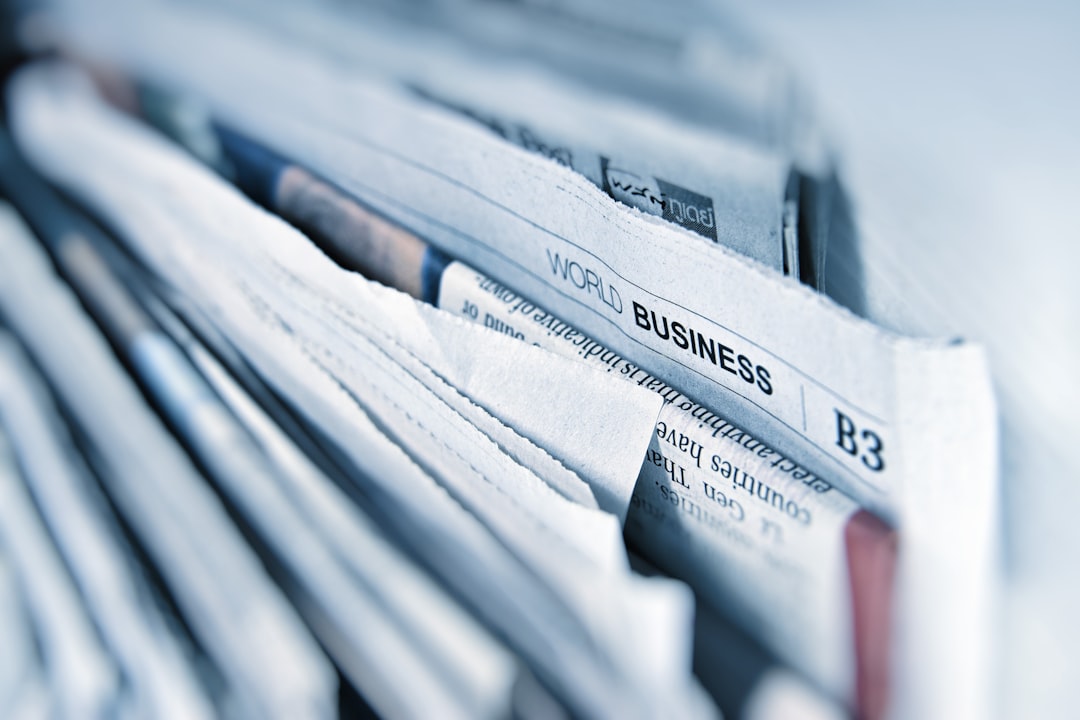 Stack of rolled newspapers representing publisher and open-web media