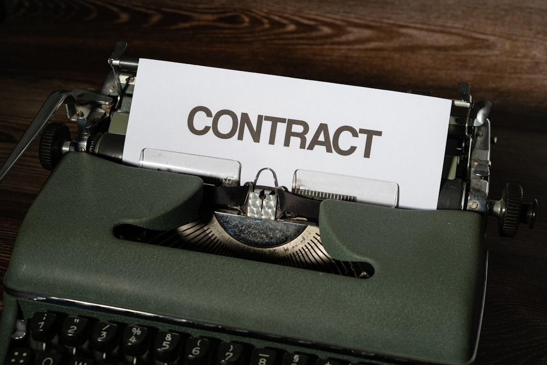A typewriter with a paper reading CONTRACT, representing vendor RFP and contract evaluation.