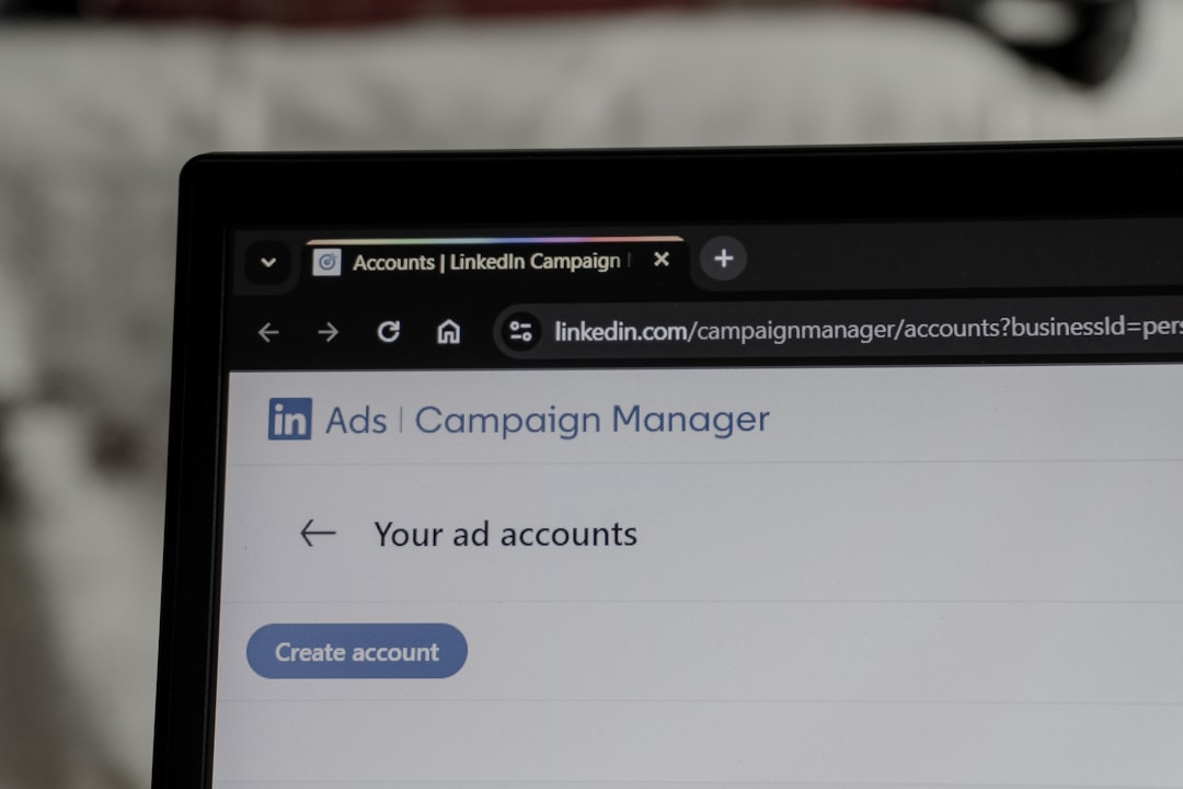 Laptop screen showing a digital ad campaign manager dashboard