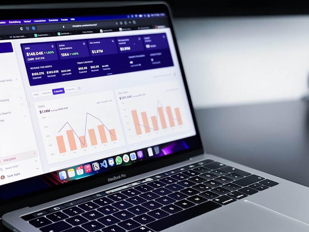 Laptop screen showing a sales analytics dashboard